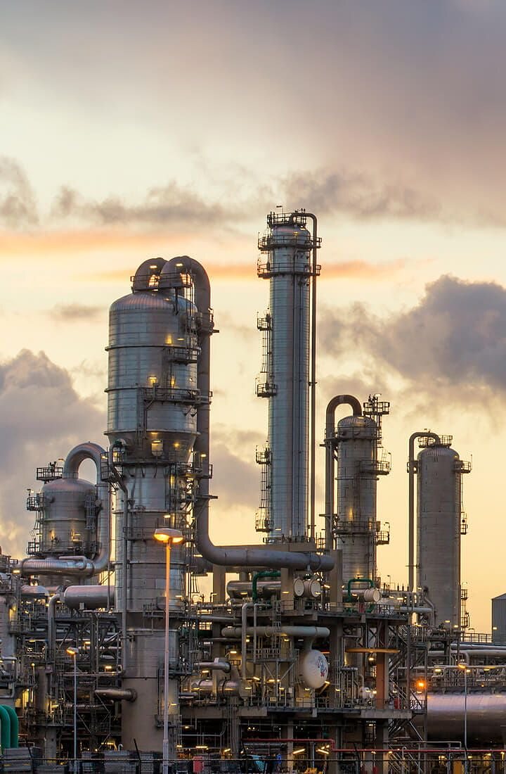 Process columns of an industrial plant at dusk